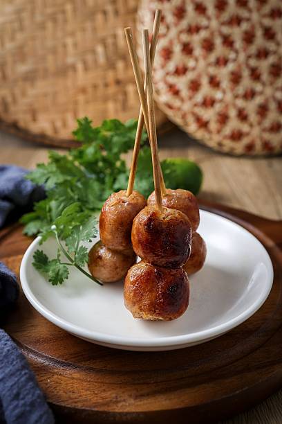 istock Griled Isaan sausages in a white plate ,Thai called sai krok isan 2236098183