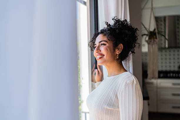 Young woman contemplating at home