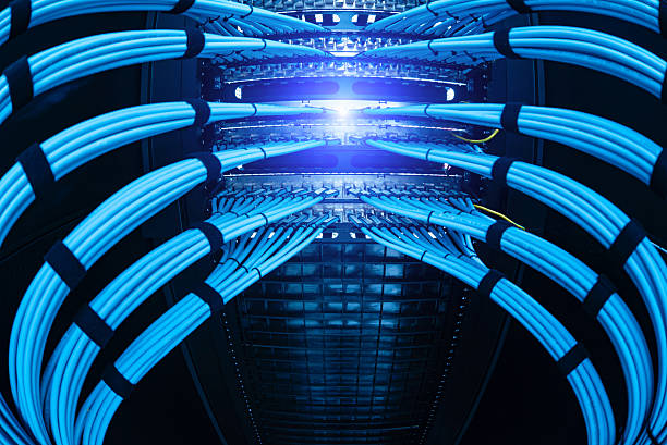istock Close-Up View of Blue Ethernet Cables in a Server Rack 2236102057