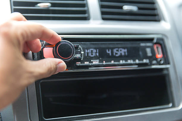 istock Unrecognizable Driver Tuning Car Radio 2236102674