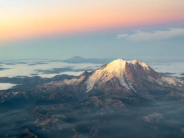 istock Sunrise on Mount Rainier viewed from a window seat from Boise to Seattle 2236104814