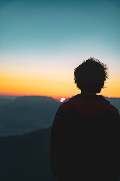 istock Silhouette Watching Sunrise Over Mountains, Gratlspitze, Austria 2236105292