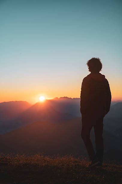 istock Silhouette Watching Sunrise Over Valley, Gratlspitze, Austria 2236105321