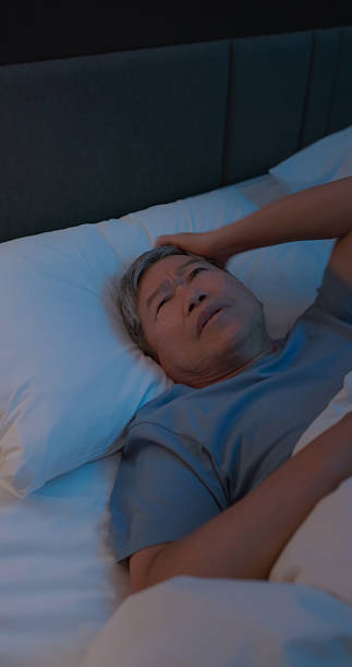 istock asian elderly man suffer from insomnia home 2236107046