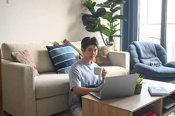 istock Man Working Comfortably Online from Home 2236107714