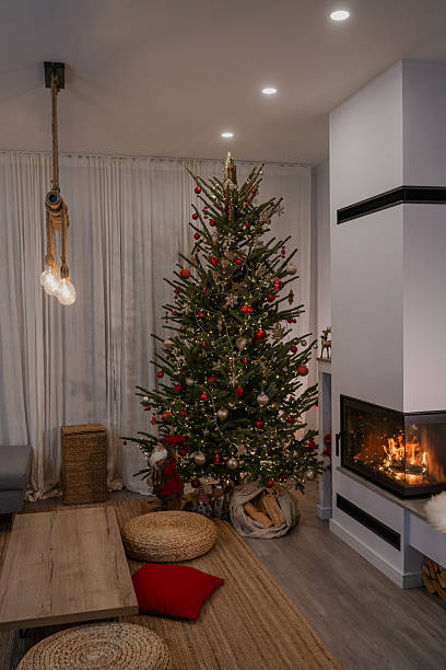 istock Festive Living Room Decorated for Christmas with Tree and Fireplace 2236108207