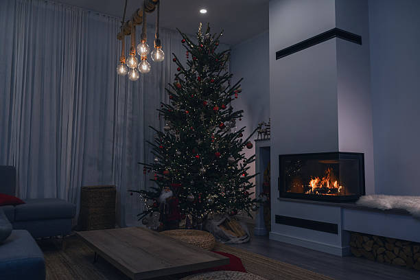 istock Festive Living Room Decorated for Christmas with Tree and Fireplace 2236108280