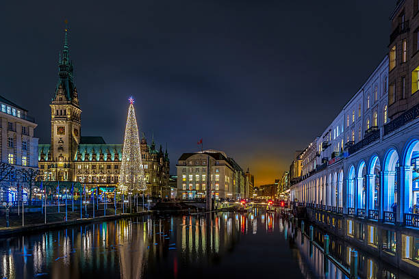 istock View onto the illuminated townhall in Hamburg with christmas tree 2236111238