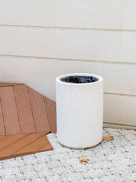 istock stone trash can in the city 2236111247