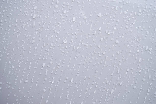 istock Water droplets on a white background. Raindrops on the window. 2236112198