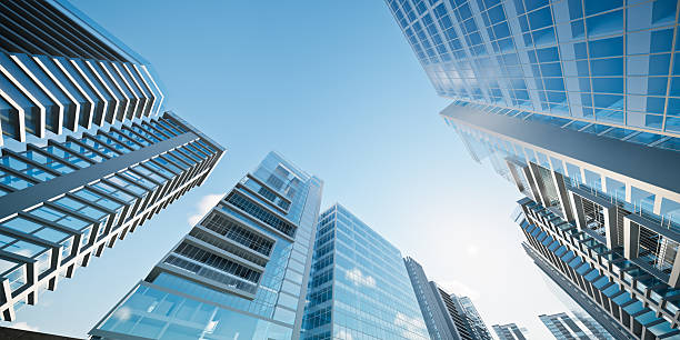 representación 3d de un edificio moderno en la ciudad. representa el desarrollo de la tierra, el crecimiento económico y la sociedad abarrotada. visuales relacionados con bienes raíces, inversión inmobiliaria, negocios corporativos y desarrollo de ciud - arquitectura exterior fotografías e imágenes de stock