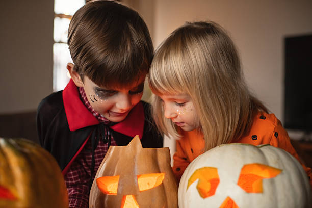 Children with pumpkins on Halloween