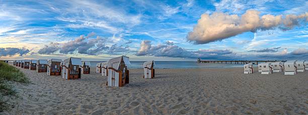 istock Zinnowitz – Beach scene with pier and beach chairs, September 2236121125