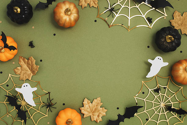 istock Happy halloween background with party decorations from pumpkins, bats, spiderweb, ghosts top view. Mystic halloween autumn greeting card. 2236121179