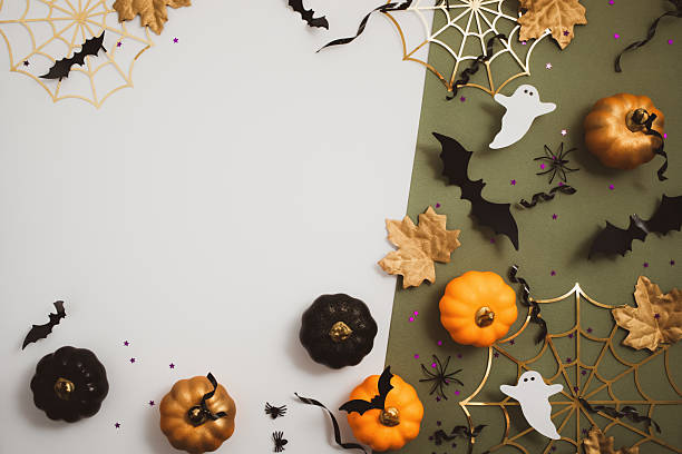 istock Happy halloween background with party decorations from pumpkins, bats, spiderweb, ghosts top view. Mystic autumn holiday greeting card concept. 2236122290