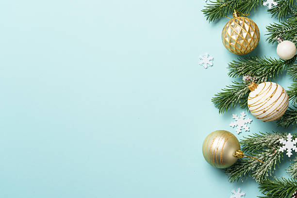 istock Christmas present with decor on blue with space for design. 2236122863