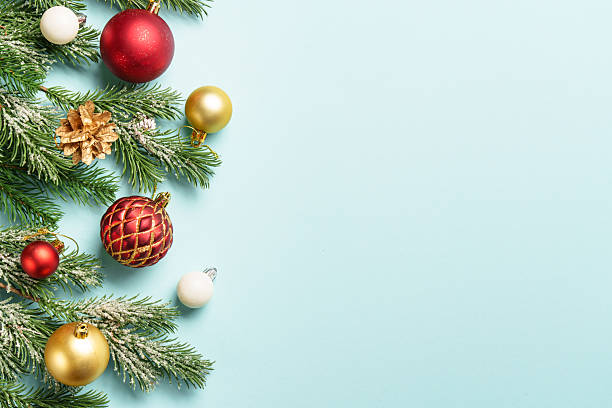 istock Christmas present with decor on blue with space for design. 2236122879
