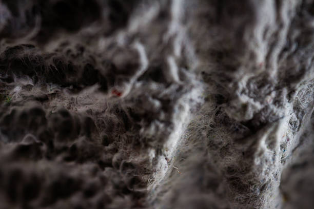 istock Extreme close up of old gray handmade paper clay with a structure and rough texture. 2236129905
