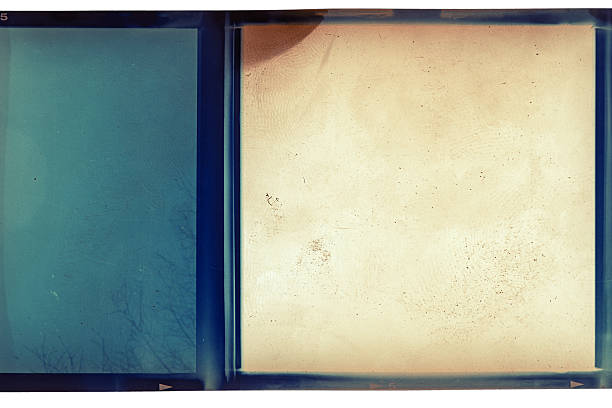 Grungy color 120mm negative film isolated on white background. Medium format film material on white background, retro photo placeholder.