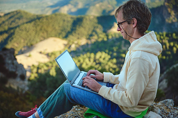 istock Remote Work Outdoors in a Scenic Mountain Environment With a Laptop 2236131737