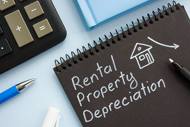 istock Handwritten note of rental property depreciation in a notebook. 2236135614