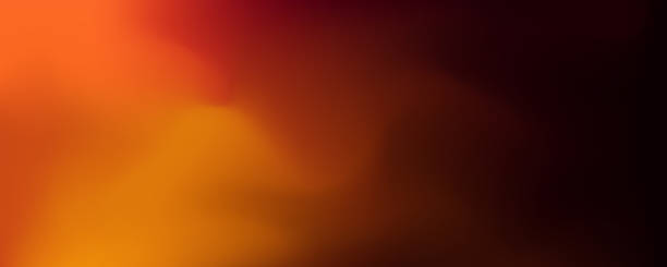 istock Warm and intense gradient background with fiery orange and deep red-brown tones. 2236138489