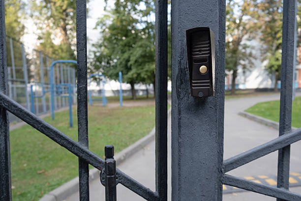 istock Entrance gate with intercom in residential yard 2236148661