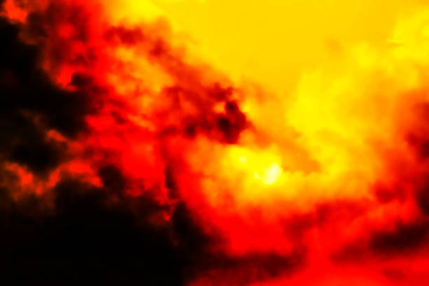 istock A breathtaking display of orange and yellow clouds 2236149795