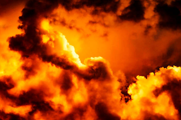 istock A breathtaking display of orange and yellow clouds 2236149800