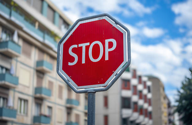 istock Urban Stop Sign with City Background 2236152303