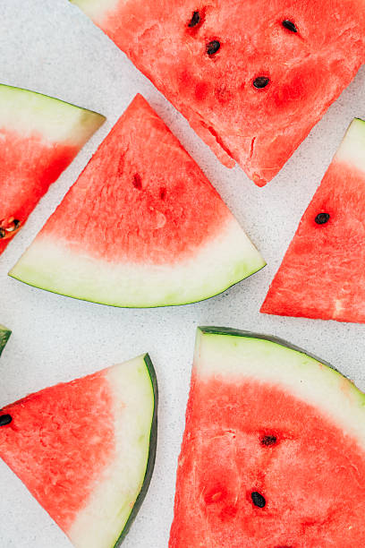 istock Fresh watermelon slices arranged on a clean surface for a summer snack or dessert 2236154332