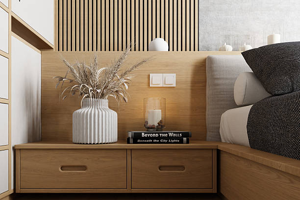Modern Japandi-style bedroom featuring a light wood bed frame, built-in nightstands, and a serene palette of beige, gray, and white. The wall behind the bed combines vertical wood slats with concrete-textured panels, accented by woven circular decor. Natural light filters through sheer curtains, enhancing the calm ambiance. This image is ideal for use in interior design portfolios, furniture catalogs, lifestyle branding, or smart home app interfaces where material contrast and minimalist styling are key.
