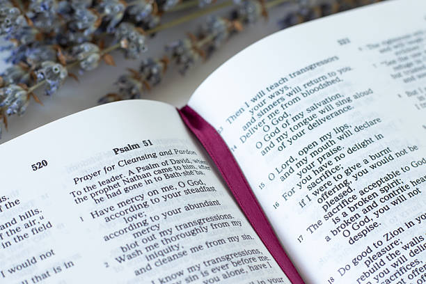 istock Psalm 51 in open holy bible book 2236158126