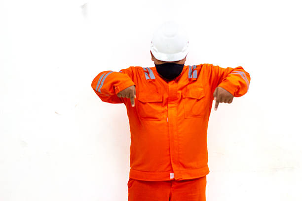 south atlantic ocean, on board ship - march 19, 2015 : crew member washing deck of a bulk carrier ship