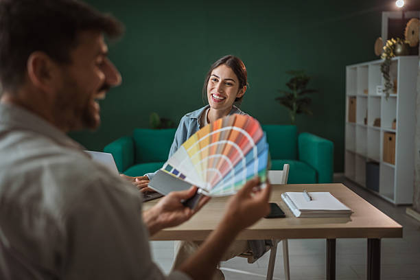 istock Woman discussing color palette for home renovation 2236159093
