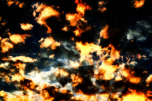 istock A breathtaking display of orange and yellow clouds 2236159435