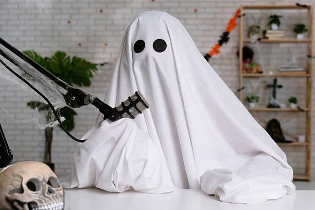istock Halloween Ghost Podcast or Blog setup with Microphone and Laptop 2236163996