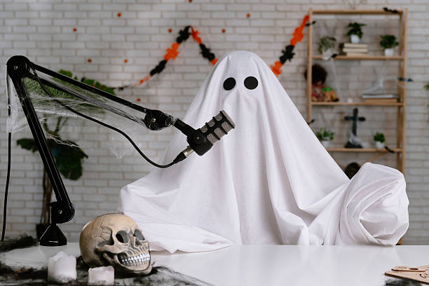 istock Halloween Ghost Podcast or Blog setup with Microphone and Laptop 2236164161