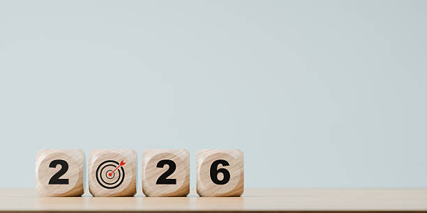 istock wooden dice with 2026 number and target icon, goal concept 2236167066