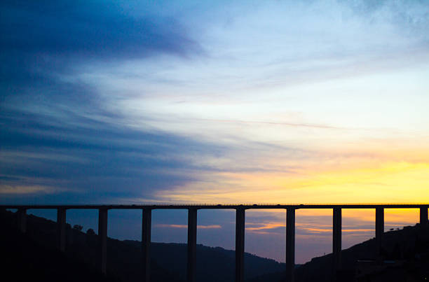 Modica, Sicily: Ponte Guerrieri (Bridge) Spanning Modica's Valley, Yellow Sunset