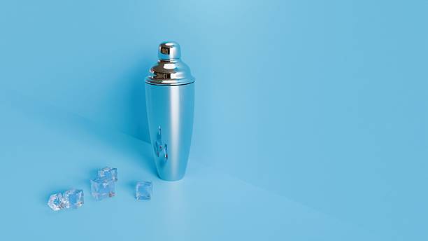 istock Single cocktail shaker with ice cubes on minimal blue background 2236174384