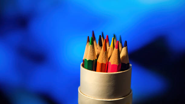 istock Coloring pencils in front of blue background 2236175747