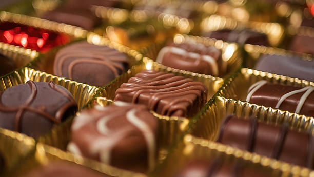 istock Delicious chocolate candies in packaging background 2236175774