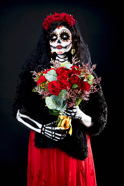 Catrina searching among the dead