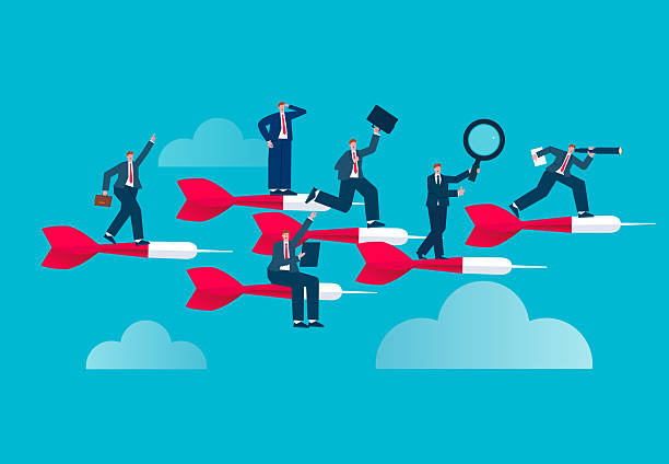 istock Marketing team, marketing strategy and plan objectives, achieving goals or accomplishments, business team members standing on darts and flying forward 2236177462