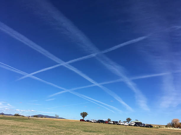 istock Cross hatched contrails from airliners in deep blue sky 2236182248