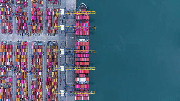 istock Aerial view container cargo ship international port terminal with gantry crane, Global business import export logistic maritime transport by container cargo ship vessel, Container ship cargo freight. 2236182421