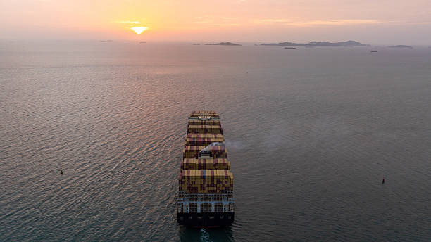 istock Container ship cargo freight shipping international sunset, Global business freight shipping import export logistic transportation container ship, Container ship cargo sea freight container ship. 2236183623