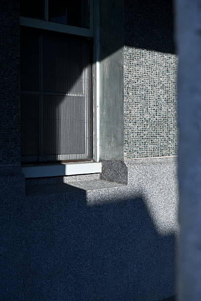 istock Abstract geometric shadows on Taiwan building with tiled wall texture 2236183872