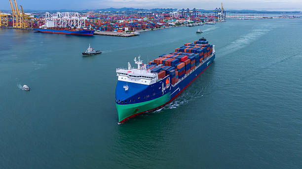 istock Aerial view from drone, Container ship or cargo shipping business logistic import and export freight transportation by container ship in open sea, Container loading cargo freight ship boat. 2236184706